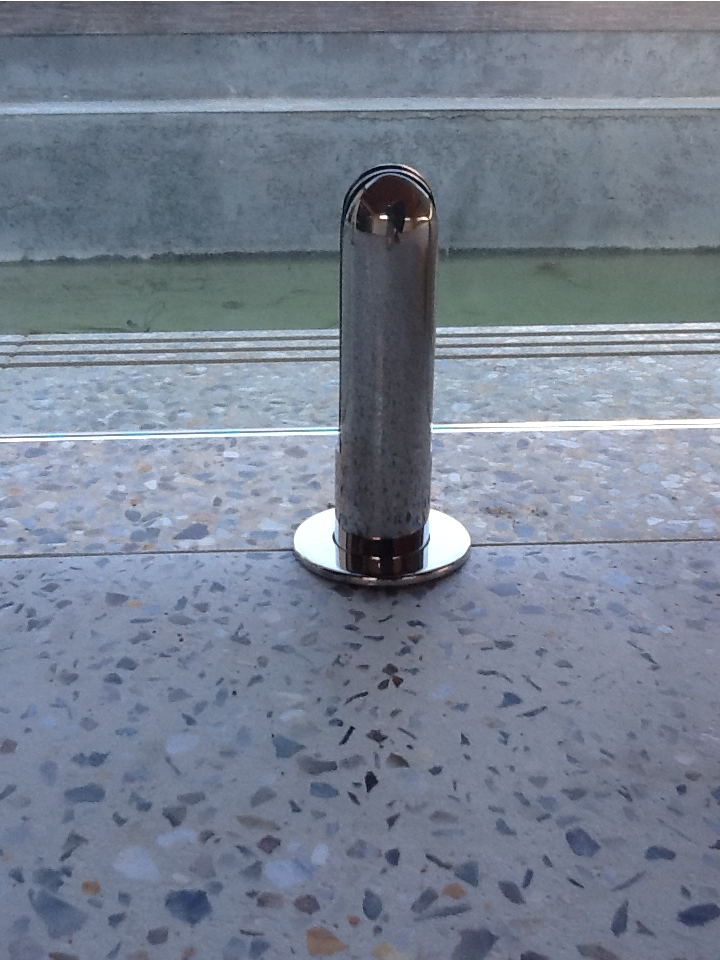 Round spigots core drilled into concrete slab